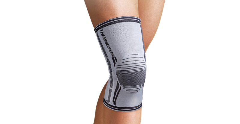 Load image into Gallery viewer, Thermoskin Dynamic Compression Knee Stabilizer