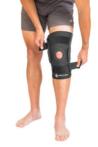 Load image into Gallery viewer, Mueller Hinged Wraparound Knee Brace, Black